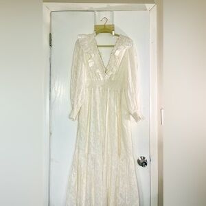 Anthropologie cream long sleeve dress.